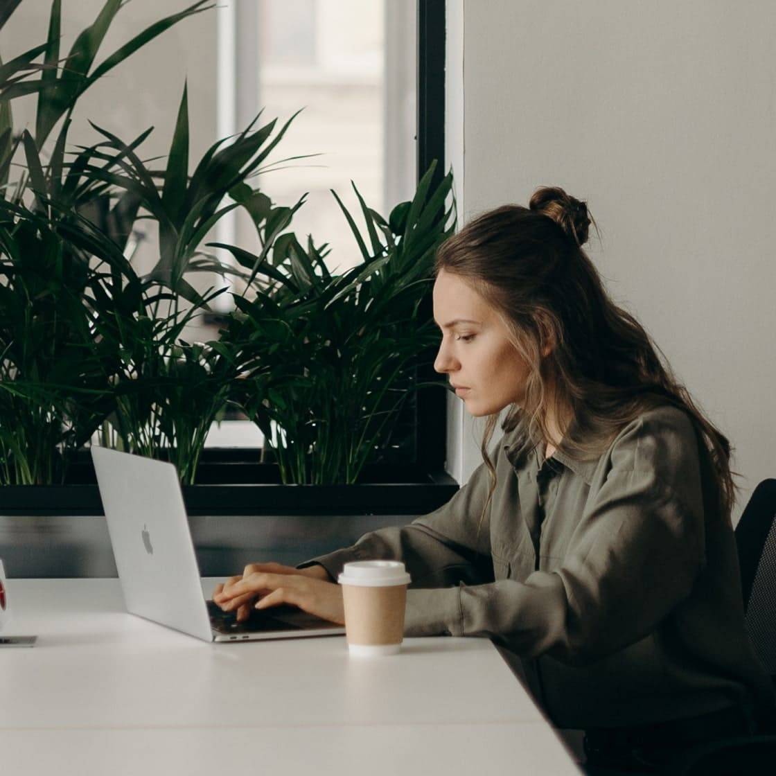 Women typing on laptop