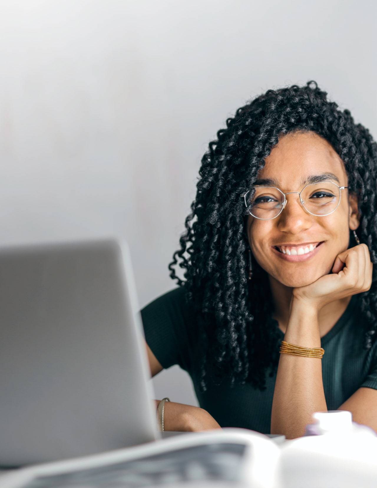 Woman with specs smiling