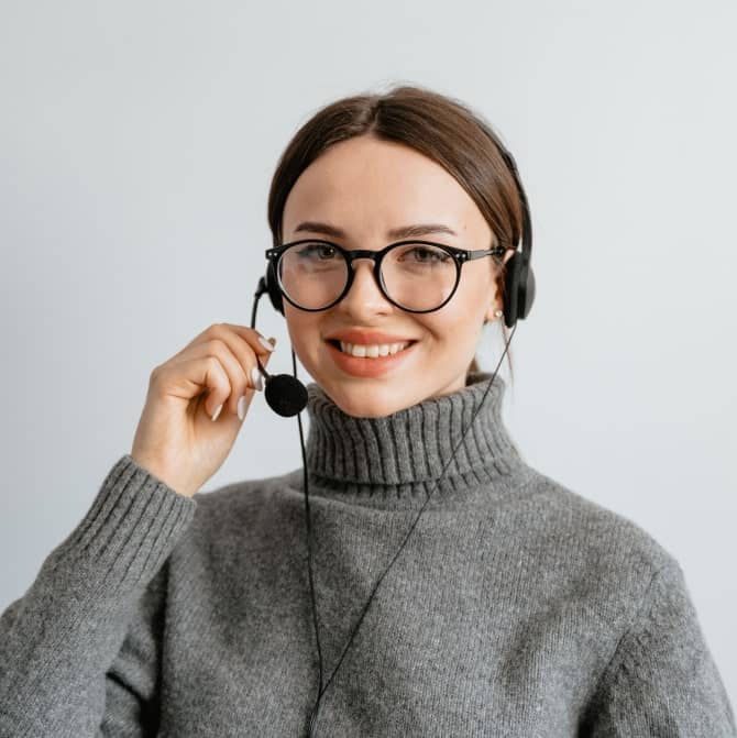 female-with-specs-holding-mic